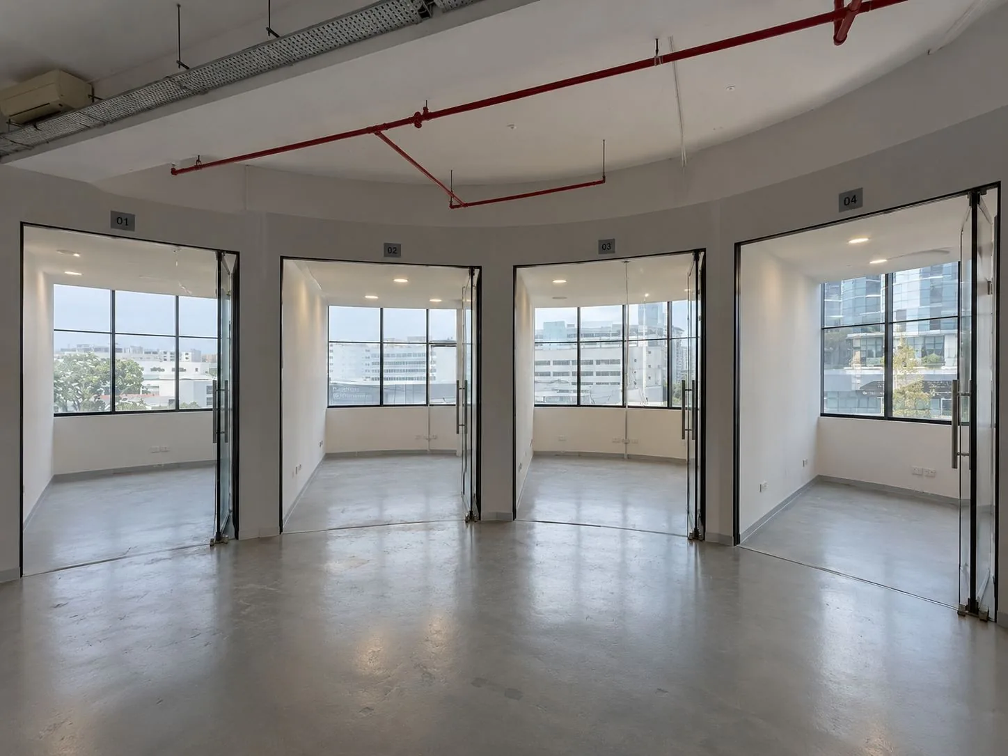 Empty commercial unit fitted out with new glass partition doors